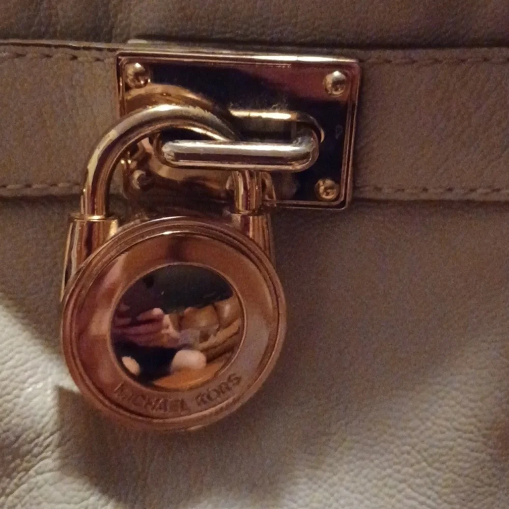 > Michael Kors Cream Leather Satchel with Gold Accents